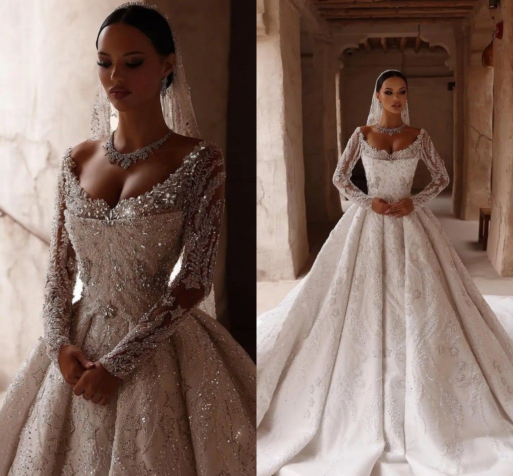 Luxury Design Crystals Dubai Saudi Arabic Princess Ball Gown Wedding Dresses With Long Sleeves Sexy Scoop Neck Beaded Chapel Train Bride Vestidos Customized