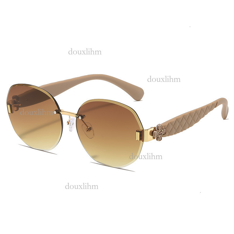 2026 Luxury Brand Fashion Accessories Designer Elliptical Frameless Glasses Wavy Clover Leg Sunglasses Women's Temperament Outdoor Sunglasses Who