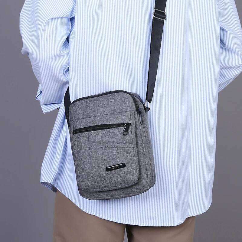 1 fashionable men's campus crossbody cloth shoulder bag, can hold mobile phones and small items, very suitable for dai XJ260109