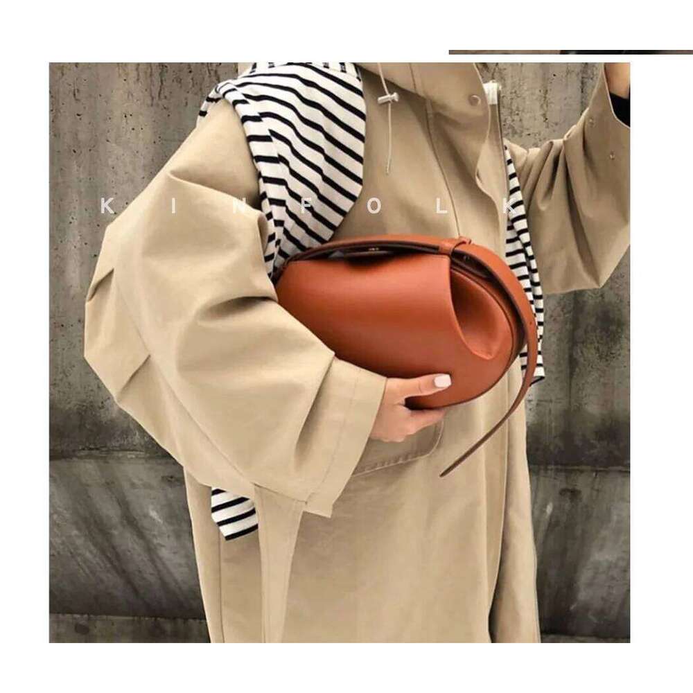 Niche popular 2025 crossbody casual versatile three-dimensional women's armpit small round French stick bag handbag XJ260109