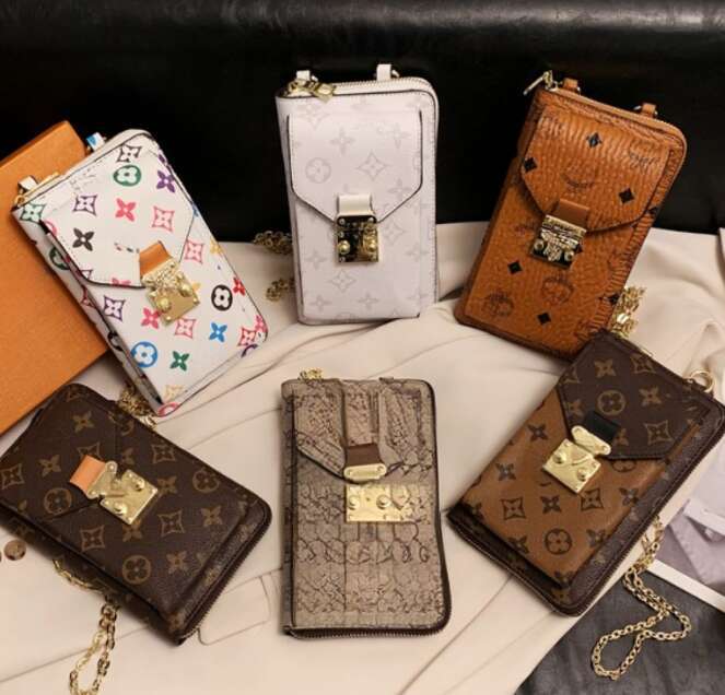 Collection of high end phone cases card holders and wallets Colorful floral patterns white striping caramel lychee texture Classic models designer bags