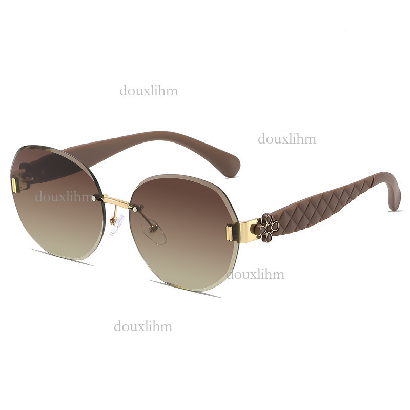 2026 Luxury Brand Fashion Accessories Designer Elliptical Frameless Glasses Wavy Clover Leg Sunglasses Women's Temperament Outdoor Sunglasses Who