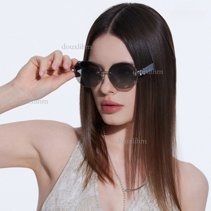 2026 Luxury Brand Fashion Accessories Designer Elliptical Frameless Glasses Wavy Clover Leg Sunglasses Women's Temperament Outdoor Sunglasses Who