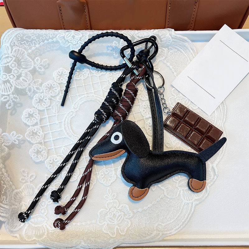 Fashionable and versatile retro sausage puppy car keychain bag pendant hanging rope chocolate woven rope accessory