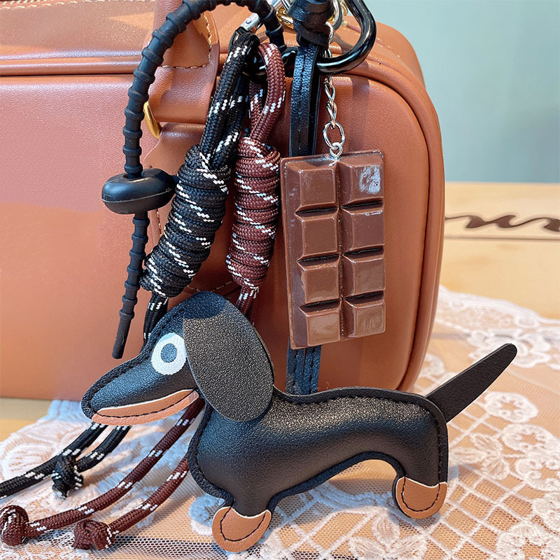 Fashionable and versatile retro sausage puppy car keychain bag pendant hanging rope chocolate woven rope accessory