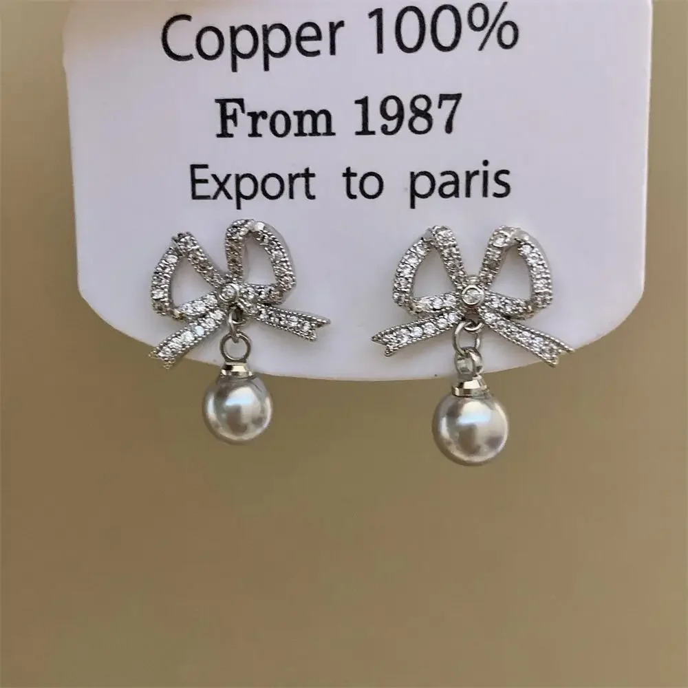 Korean Full Drill Butterfly Knot Earrings Womens High-End Elegant Pearl Zircon Silver Needle Ear Jewelry Fashion Accessories 260107