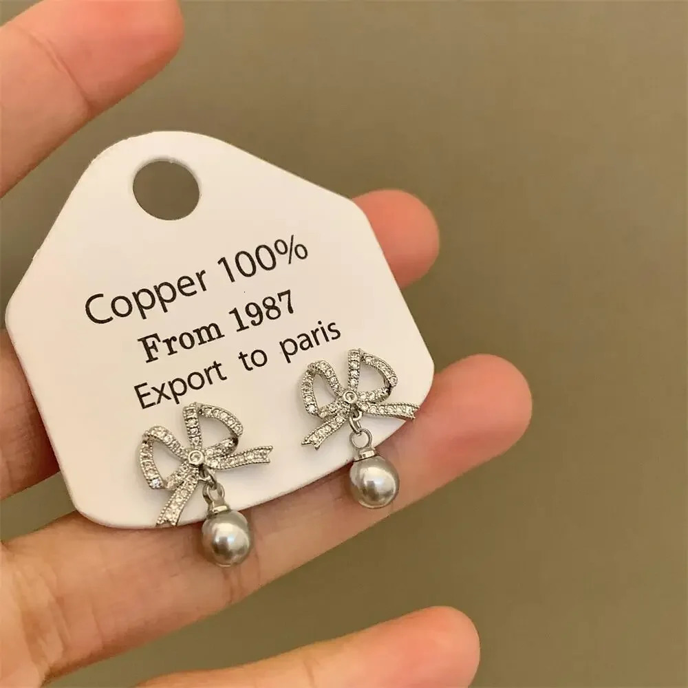 Korean Full Drill Butterfly Knot Earrings Womens High-End Elegant Pearl Zircon Silver Needle Ear Jewelry Fashion Accessories 260107