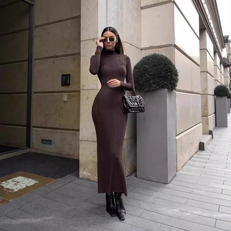 E116 European and American knitted turtleneck long-sleeved tight skirt autumn and winter new long dress elegant French knitted dress women's