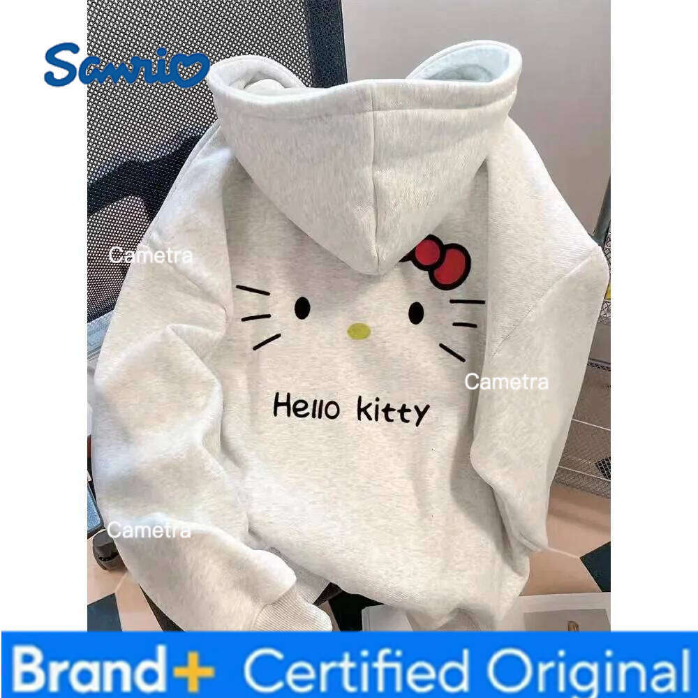 Sanrio MINISO Autumn Cartoon Hello Kitty Print Long-sleeved Hooded New Loose Fashion Tops Winter Clothes Women Warm and Soft H260112