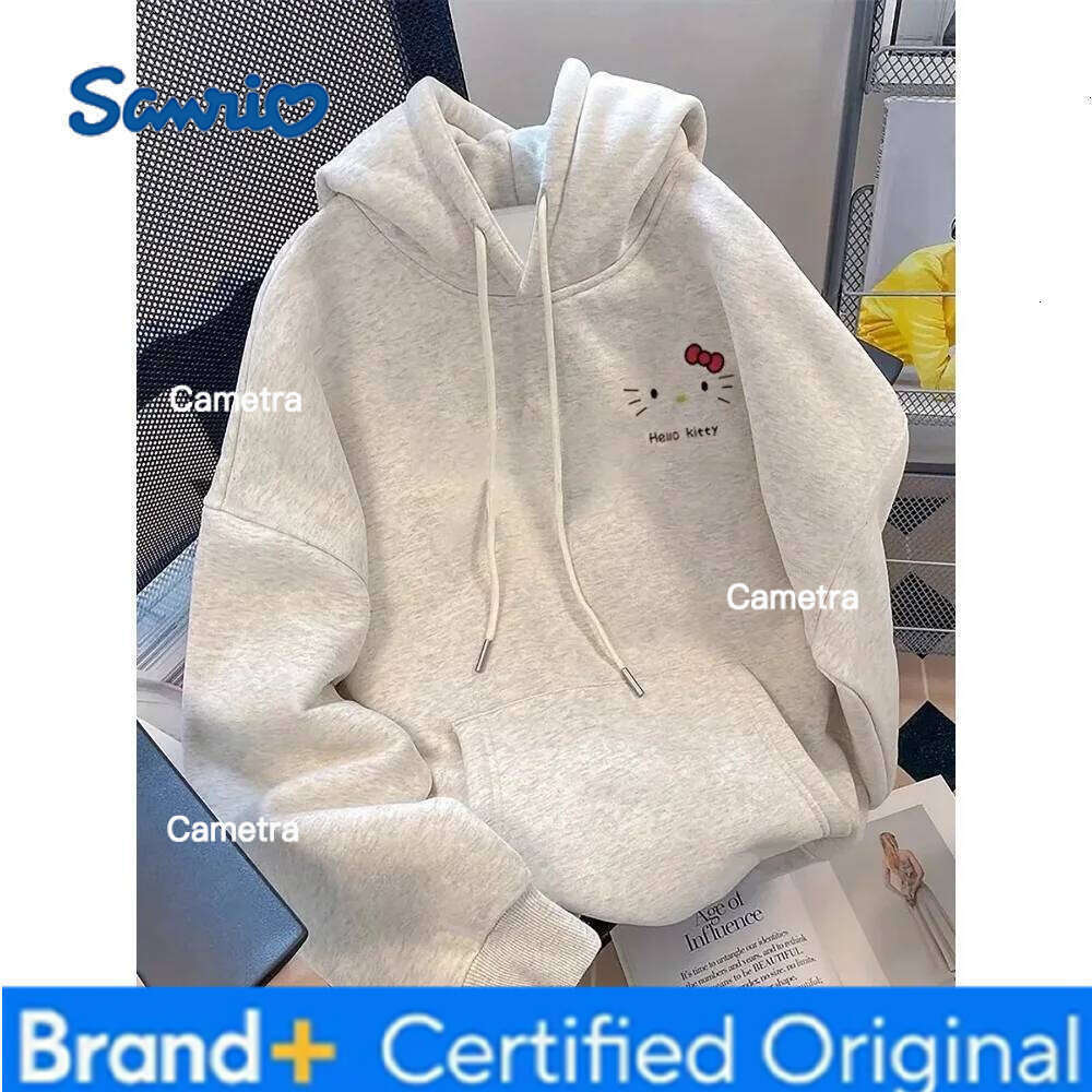 Sanrio MINISO Autumn Cartoon Hello Kitty Print Long-sleeved Hooded New Loose Fashion Tops Winter Clothes Women Warm and Soft H2601121