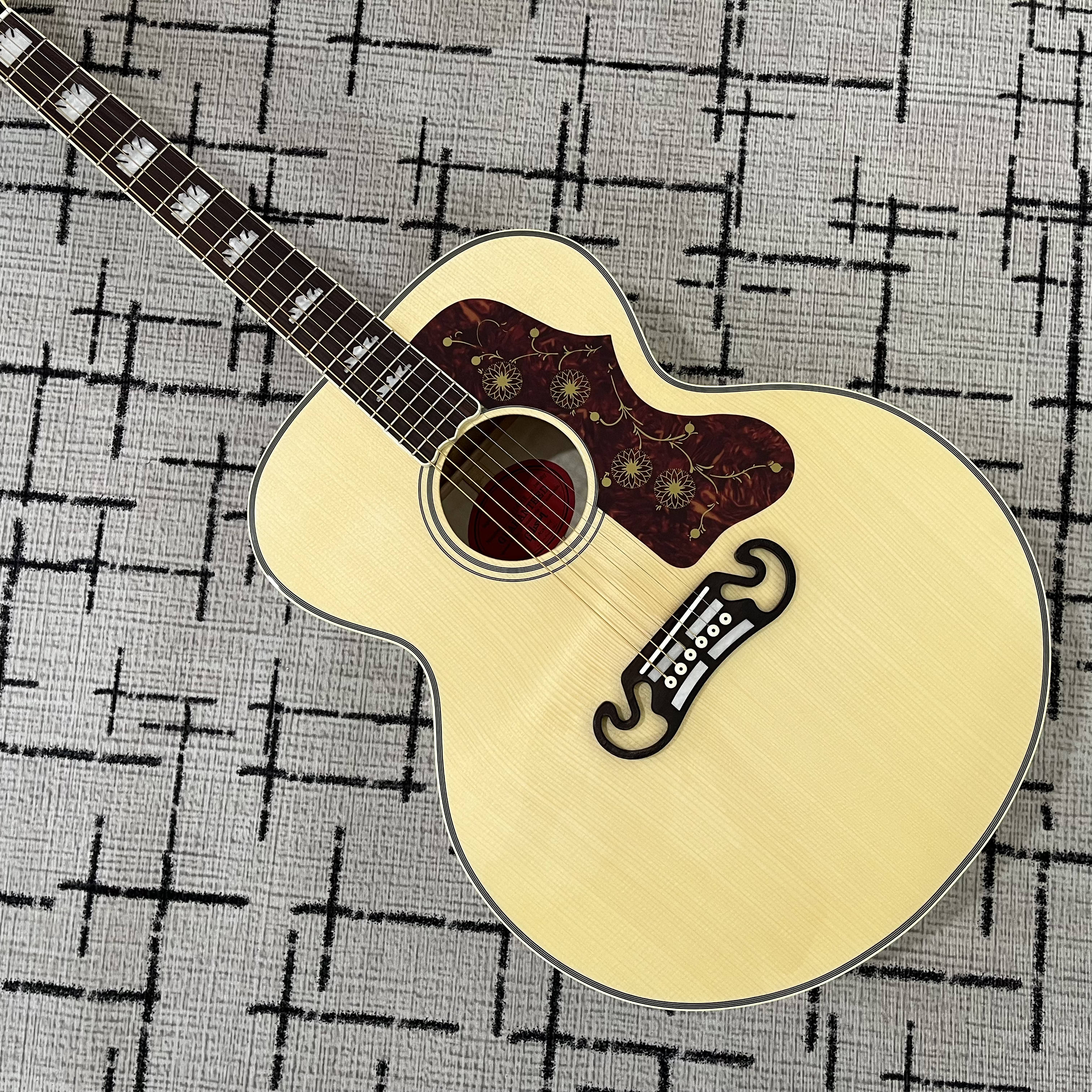 High-quality acoustic guitar. Solid spruce top. Rosewood fingerboard. Hollow body. 20 frets. Real pictures.