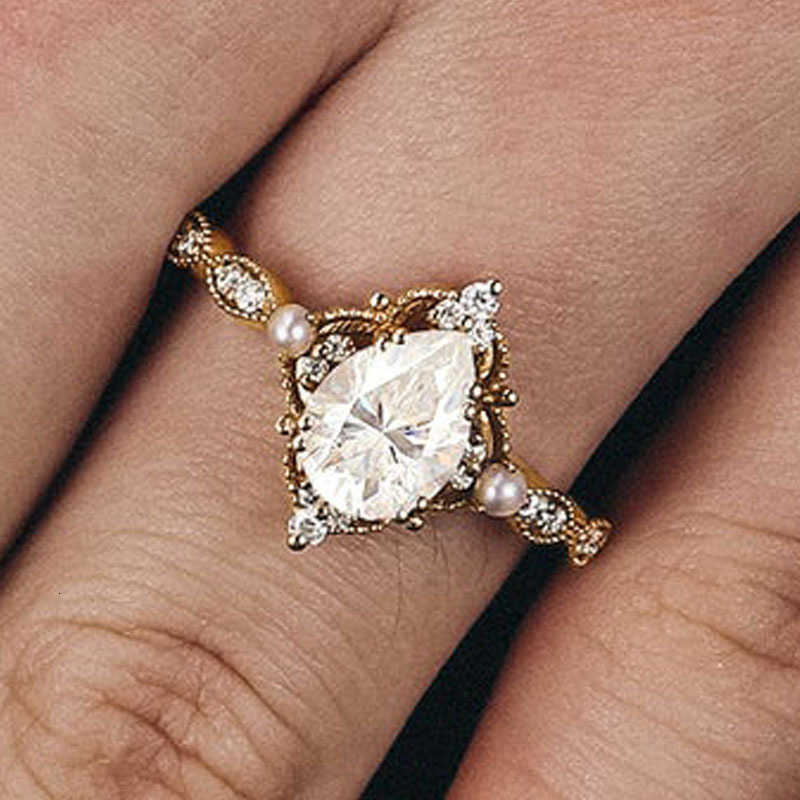 European and American jewelry copper inlaid water drop zircon pearl ring high-end lace crown finger ringXJ251031