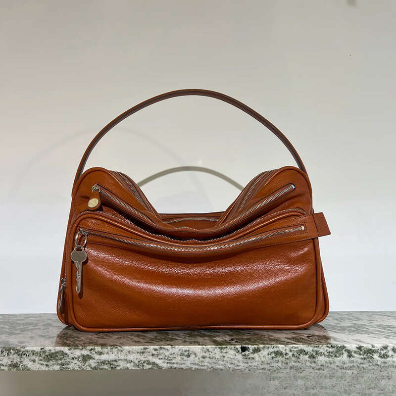 Designer Bag Swedish Niche New Genuine Leather Multi Compartment Zipper Handbag Key Pendant Underarm Motorcycle Single Shoulder Crossbody Bag