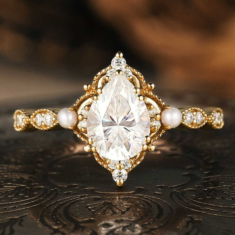 European and American jewelry copper inlaid water drop zircon pearl ring high-end lace crown finger ringXJ251031