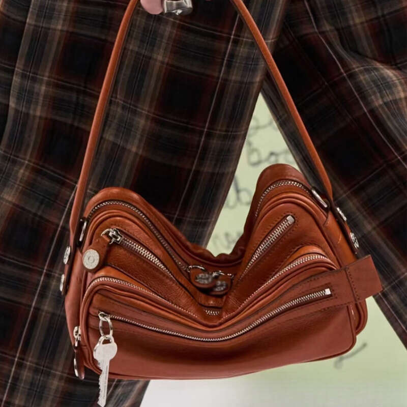 Designer Bag Swedish Niche New Genuine Leather Multi Compartment Zipper Handbag Key Pendant Underarm Motorcycle Single Shoulder Crossbody Bag
