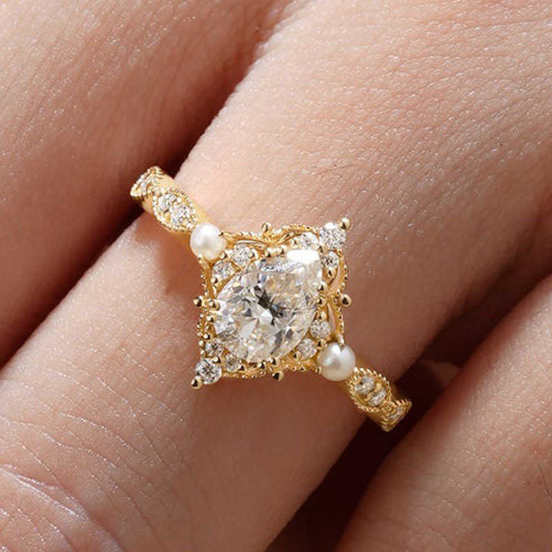 European and American jewelry copper inlaid water drop zircon pearl ring high-end lace crown finger ringXJ251031