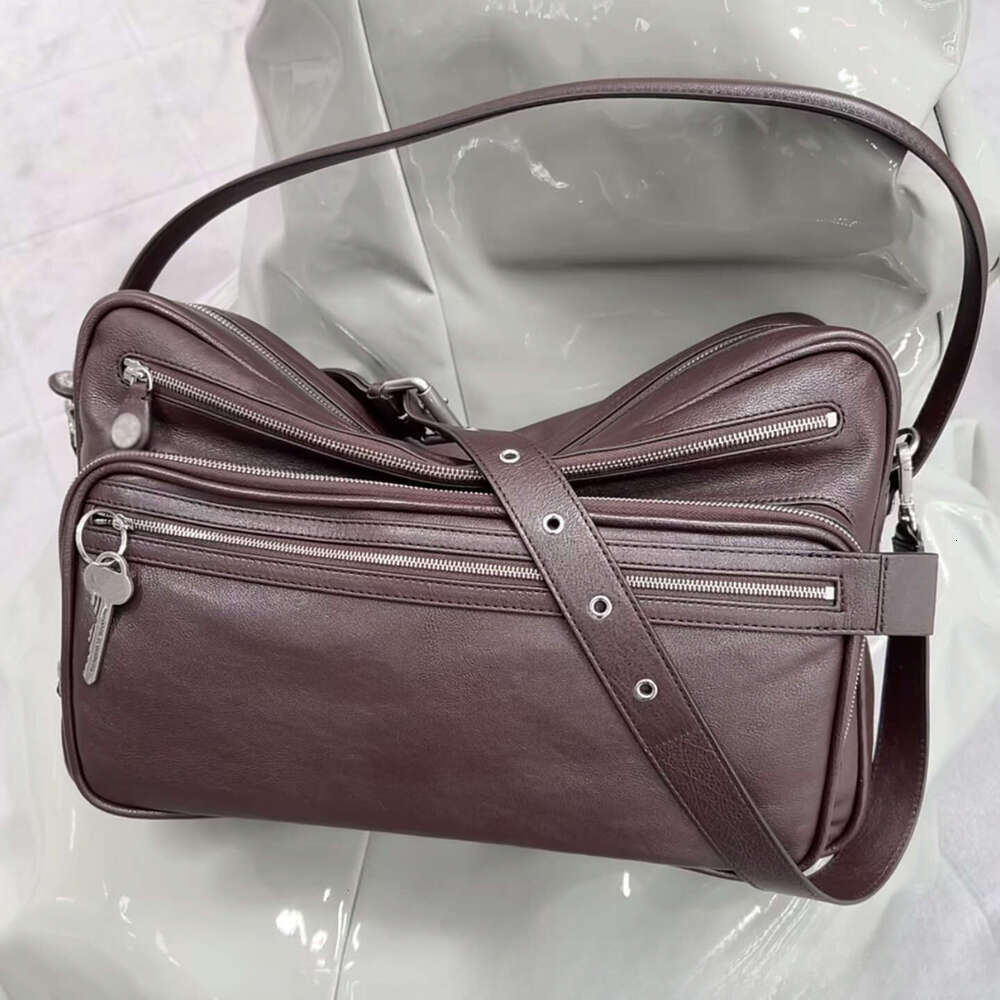 Designer Bag Swedish Niche New Genuine Leather Multi Compartment Zipper Handbag Key Pendant Underarm Motorcycle Single Shoulder Crossbody Bag