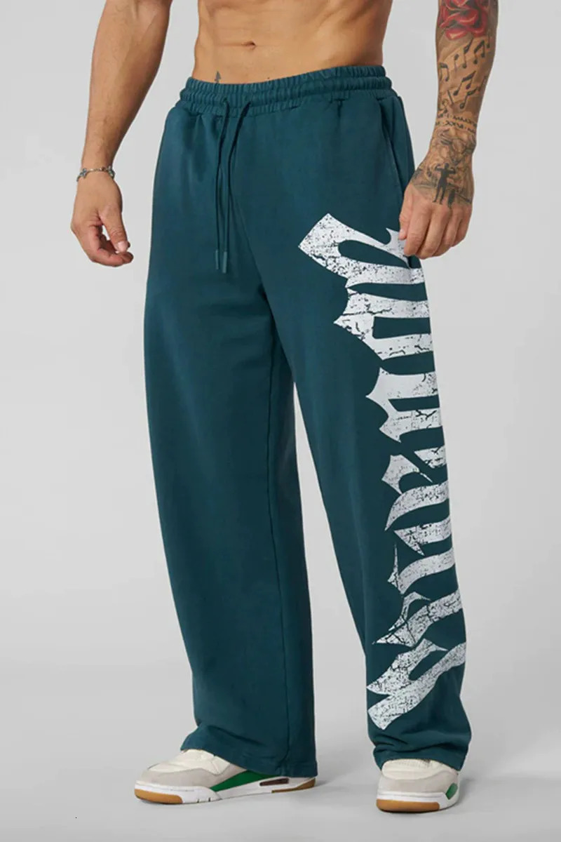 Young American trendy sweatpants collaboration anime joggers cotton terry print wideleg casual pants hiphop street 260109
