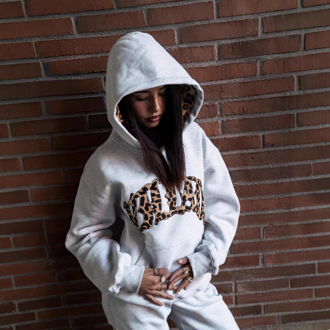 The 2026 New Model Of The Luxurious Brand's Design Features Striped Print Letter Embroidery Street Casual Pants With A Lining And A Hooded Design