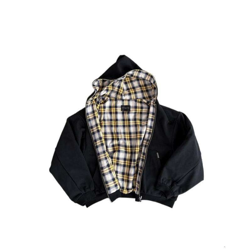 The Clothing Designed By A Luxury Brand Designer Is A Double Zipper Hooded Sweatshirt With A Retro Yellow Checkered Pattern That Can Be Flipped Over I
