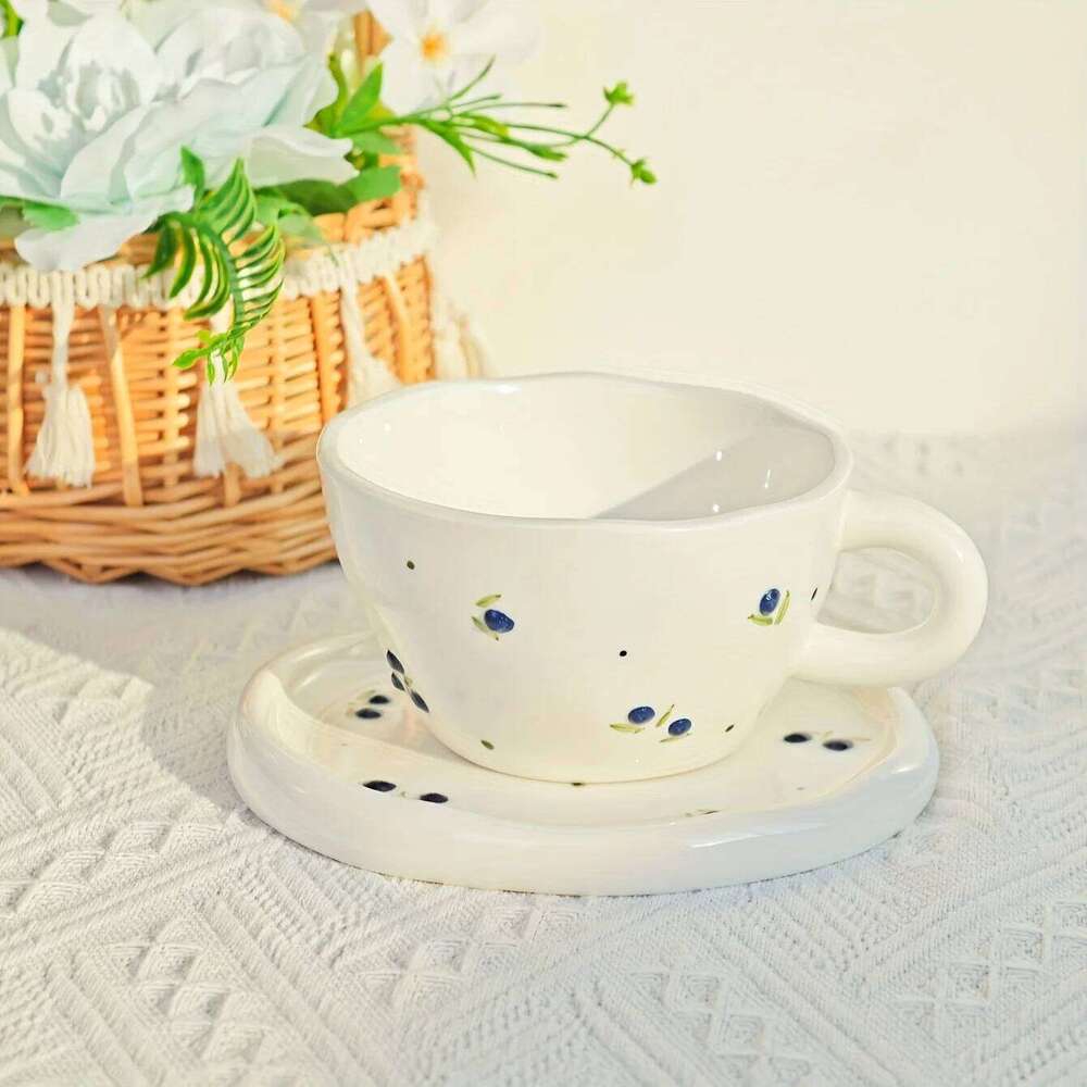 Creative, minimalist, hand drawn, three-dimensional relief cherry blueberry, household ceramic coffee cups and plates
