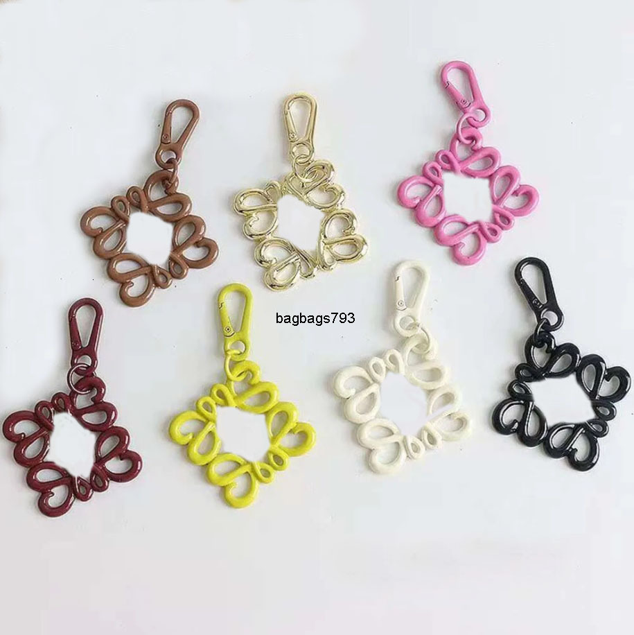 Keychains Lanyards Metal Candy Colored Love Chinese Knot Keychain Bag Pendant Hollow Designer Keychains Personalized And Fashion Decoration Accessories