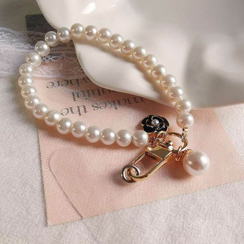 Double Layer Pearl Phone Wristlet with Camellia Pendant - Detachable Strap for Phones, Bags & Keys, Trendy Women's Accessory