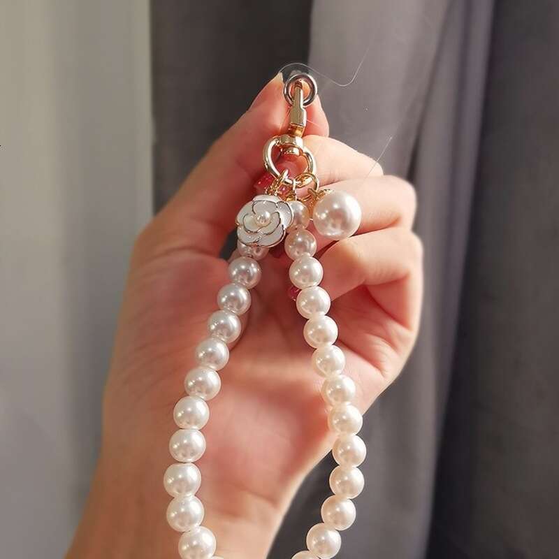 Double Layer Pearl Phone Wristlet with Camellia Pendant - Detachable Strap for Phones, Bags & Keys, Trendy Women's Accessory