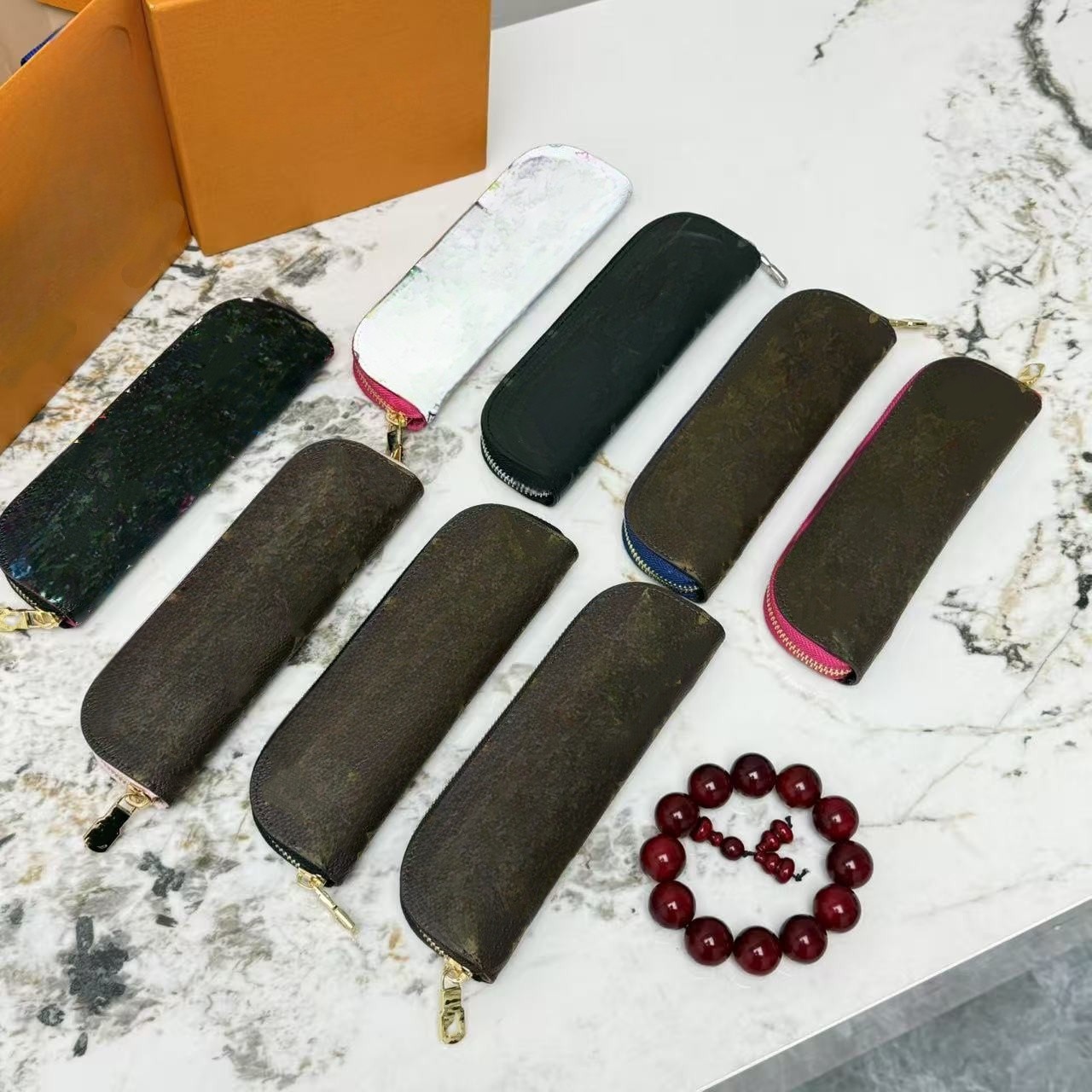 Luxury Pen Bag Pencil Case Designer Bag Pencil Pouch Pen Case Makeup Bag Cosmetic Bags Zipper Cylinder Bag Barrel Bag Purse Handbags Toiletry Bag lvslys Lipstick Case