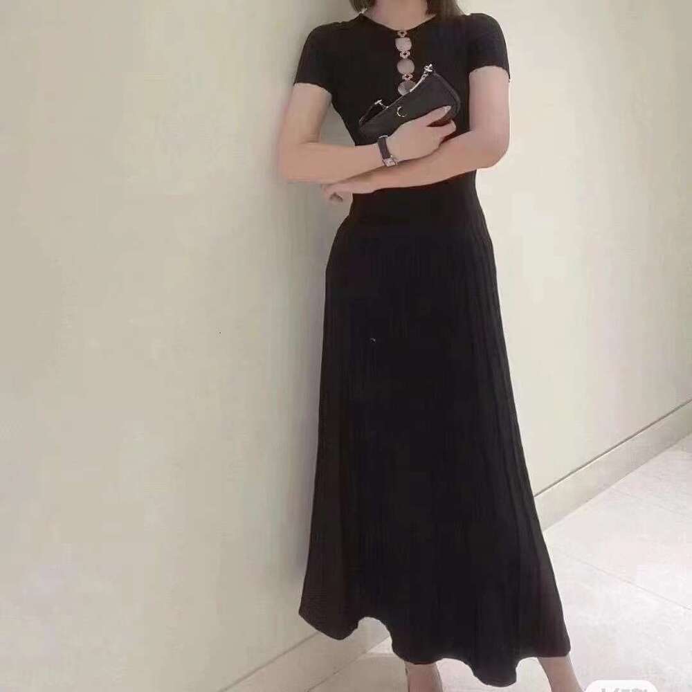 2026 Spring Summer New French Style Niche Hollow Waist Black Knitted Long Dress for Women M