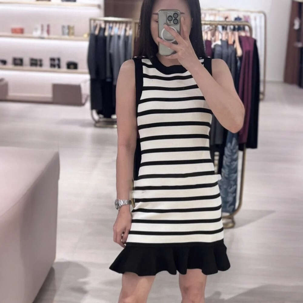 S French Niche 2026 Early Spring Elegant Shoulder Buckle Striped Bodycon Mermaid Knitted Dress for Women
