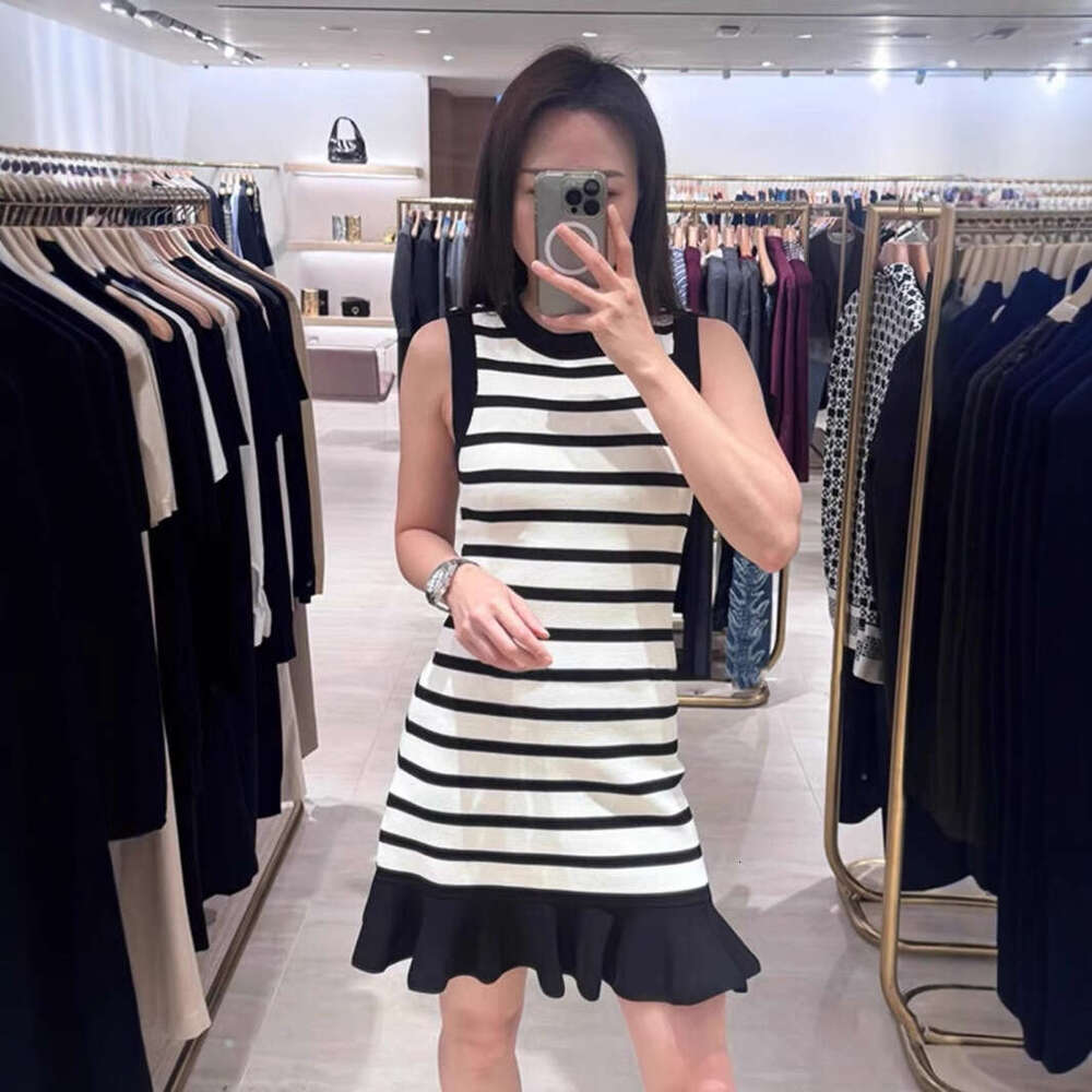 S French Niche 2026 Early Spring Elegant Shoulder Buckle Striped Bodycon Mermaid Knitted Dress for Women