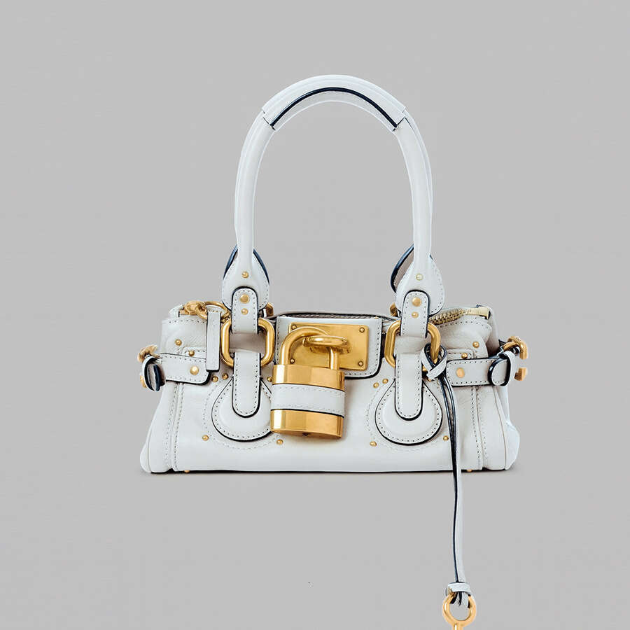 Women 2026 Cross Border New Autumn European And Retro Style Versatile Fashion Lock Rivet Pillow Bag Women S Handbag