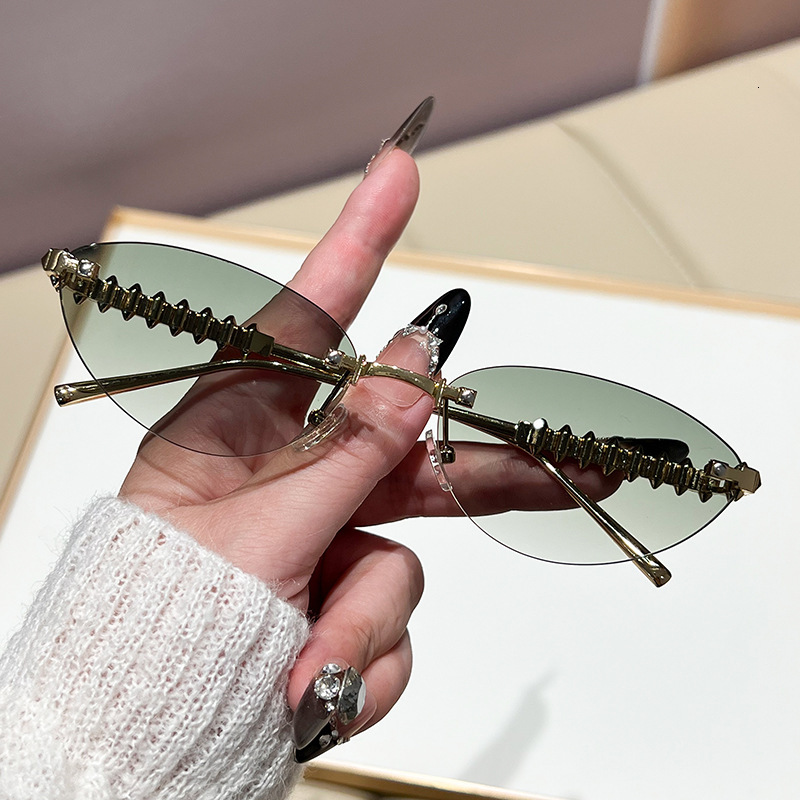 Luxury Brand Designer Sunglasses New European And American INS Style Fashion Sunglasses Cat Eye Sunglasses Unisex Metal Rivet Rimless Sunglasses