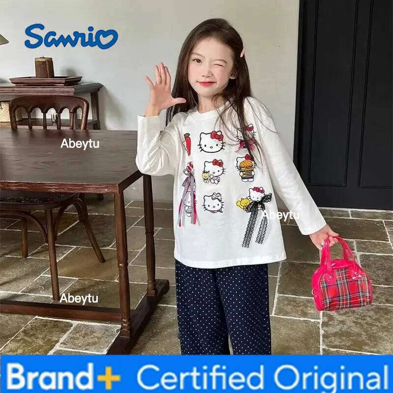 Sanrio Hello Kitty Girls Anime Cartoon Bow T Shirt Kawaii Spring and Autumn New White Print Long Sleeve Fashionable Versatile H260120