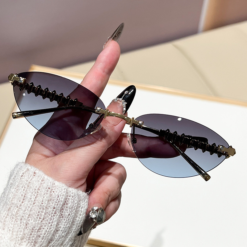 Luxury Brand Designer Sunglasses New European And American INS Style Fashion Sunglasses Cat Eye Sunglasses Unisex Metal Rivet Rimless Sunglasses
