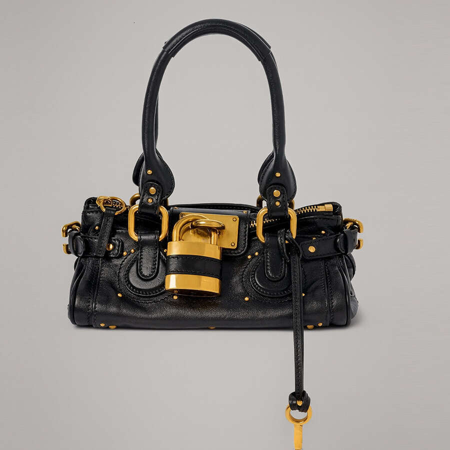 Women 2026 Cross Border New Autumn European And Retro Style Versatile Fashion Lock Rivet Pillow Bag Women S Handbag