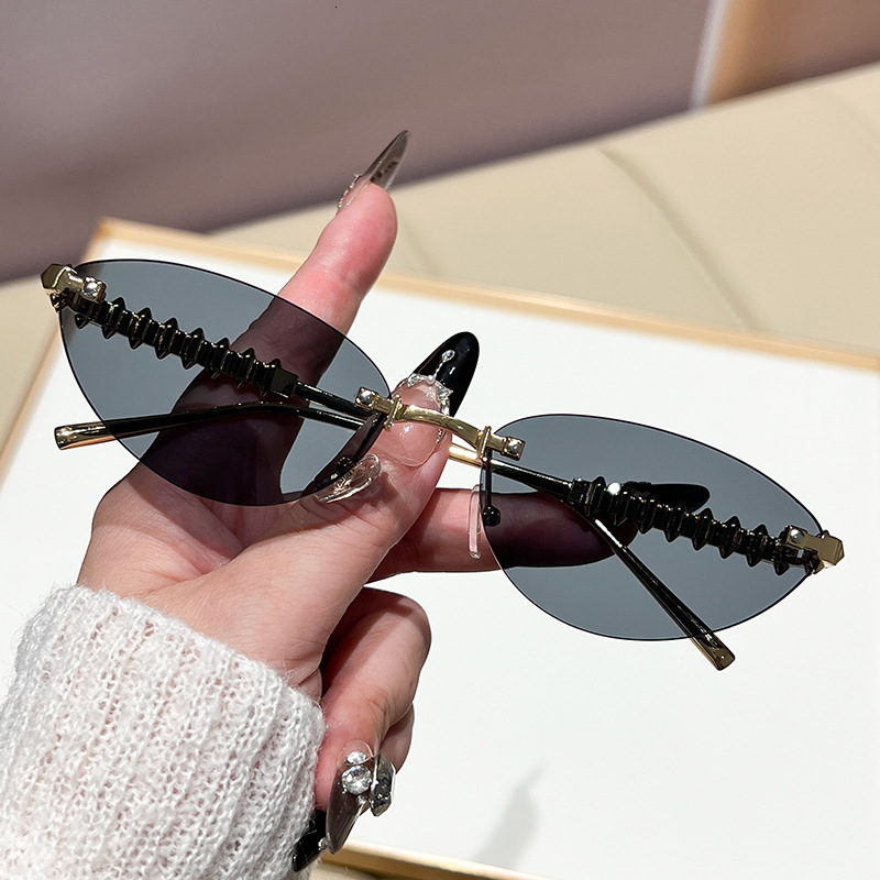 Luxury Brand Designer Sunglasses New European And American INS Style Fashion Sunglasses Cat Eye Sunglasses Unisex Metal Rivet Rimless Sunglasses