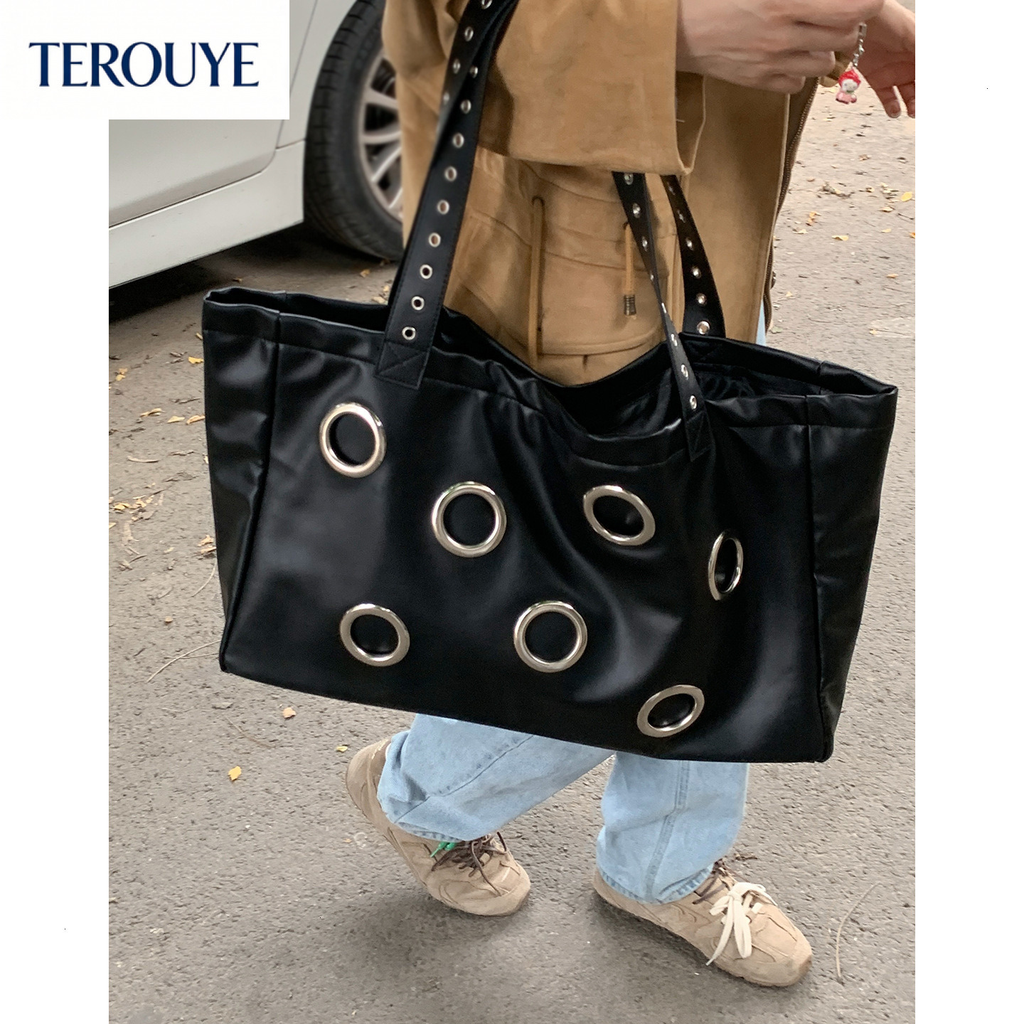 TEROUYE Korean style niche large capacity women s handbag new simple women s armpit bag hole design trendy luxury Luxury bag
