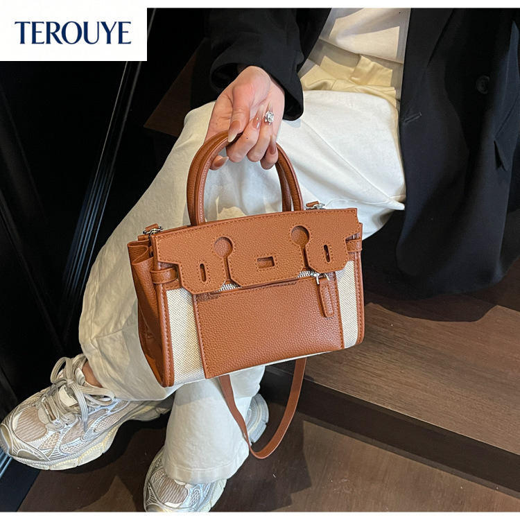 TEROUYE Fashionable and minimalist color blocked women s handbag for autumn and winter retro style large capacity armpit bag with texture and luxuriou
