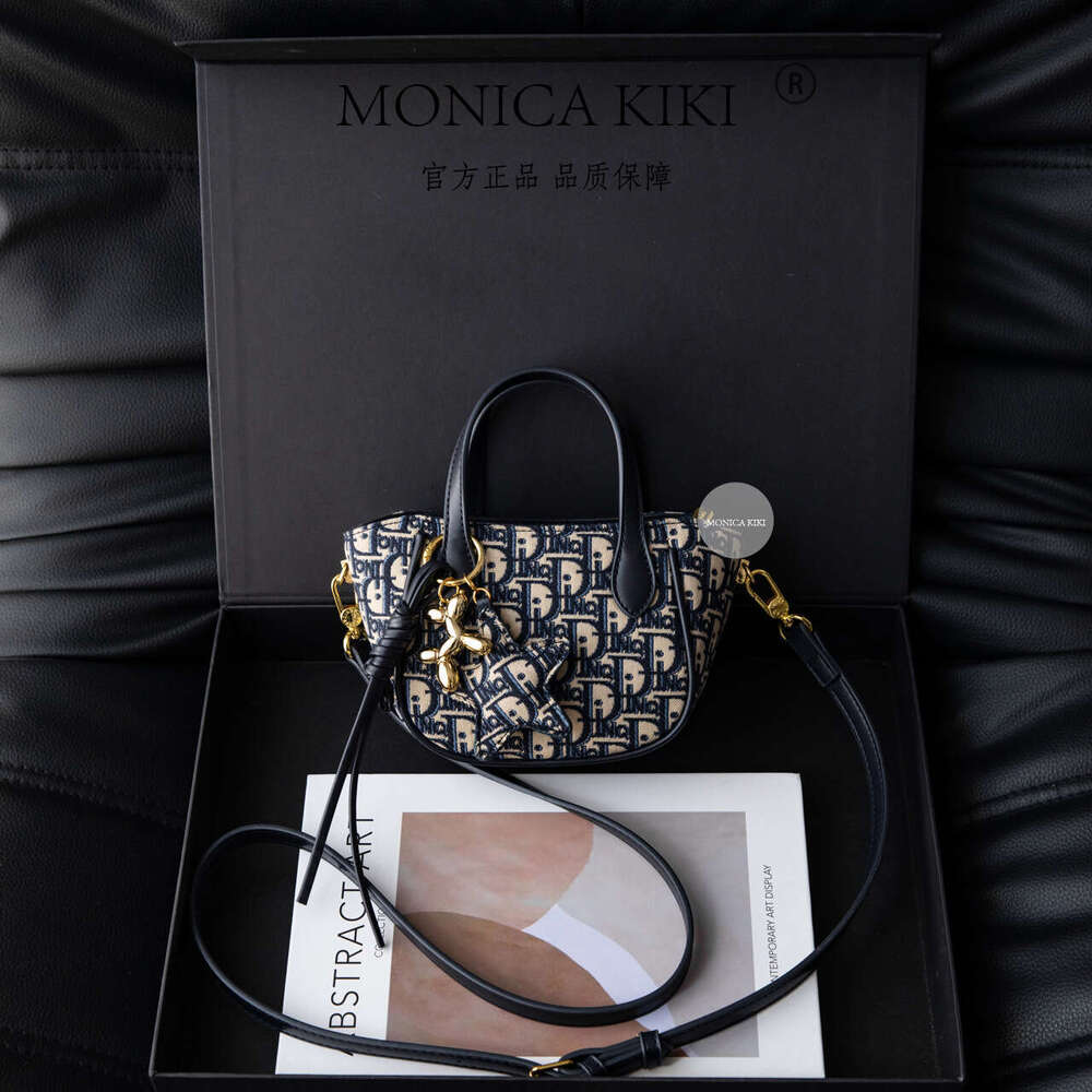 Monica kiki Light Luxury Jacquard Embroidery Handheld Bucket for Women New Large Capacity High-end Crossbody Bag