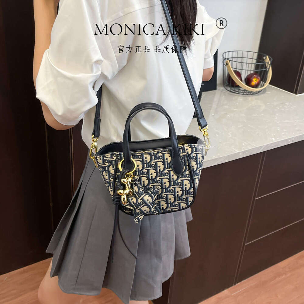 Monica kiki Light Luxury Jacquard Embroidery Handheld Bucket for Women New Large Capacity High-end Crossbody Bag