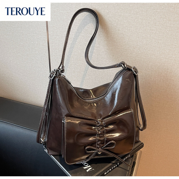 TEROUYE Retro fashion women s handbag Korean style large capacity shoulder bag autumn and winter new casual bow design backpack luxury Luxury bag