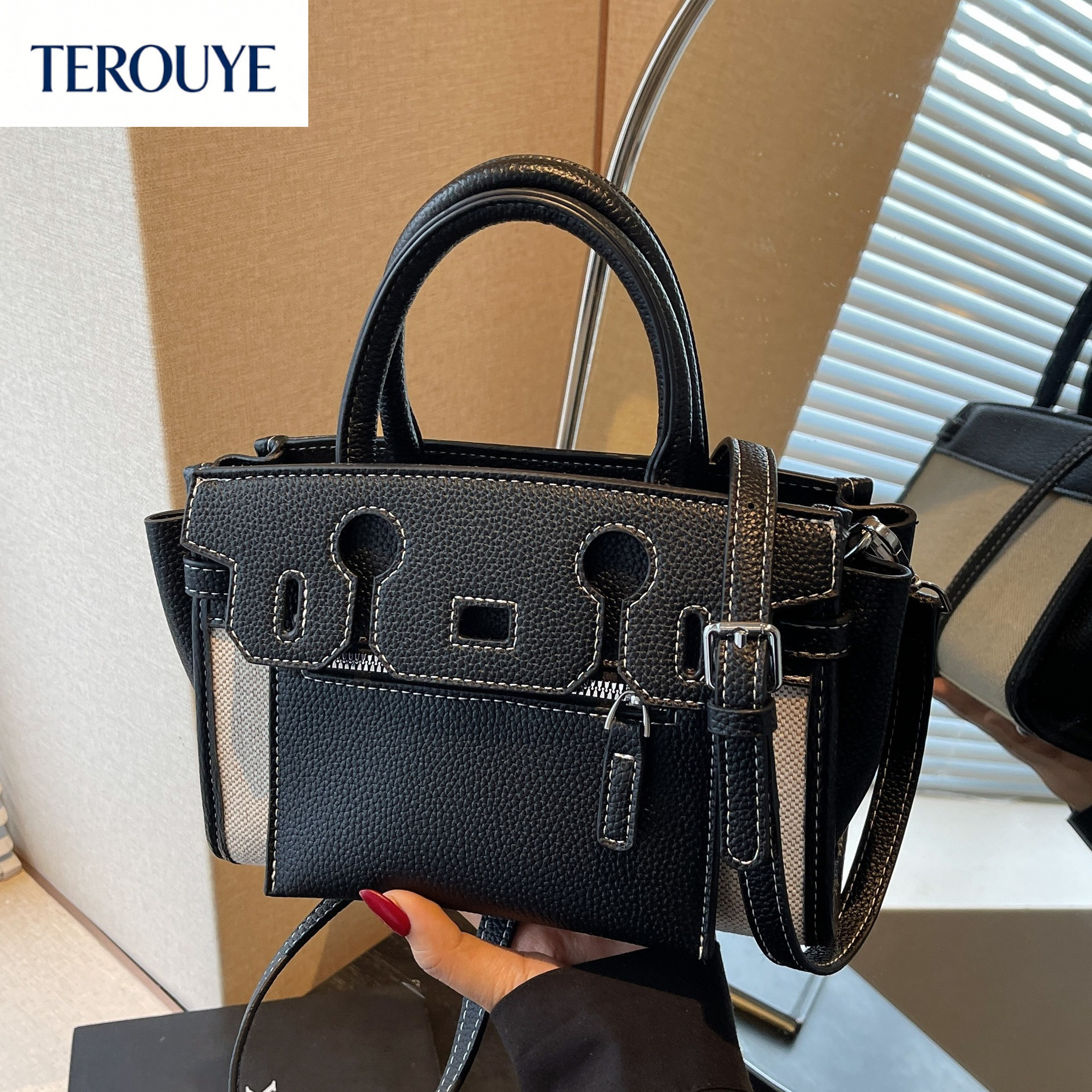 TEROUYE Fashionable and minimalist color blocked women s handbag for autumn and winter retro style large capacity armpit bag with texture and luxuriou
