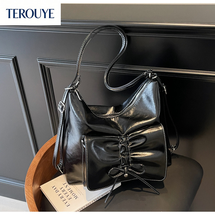 TEROUYE Retro fashion women s handbag Korean style large capacity shoulder bag autumn and winter new casual bow design backpack luxury Luxury bag