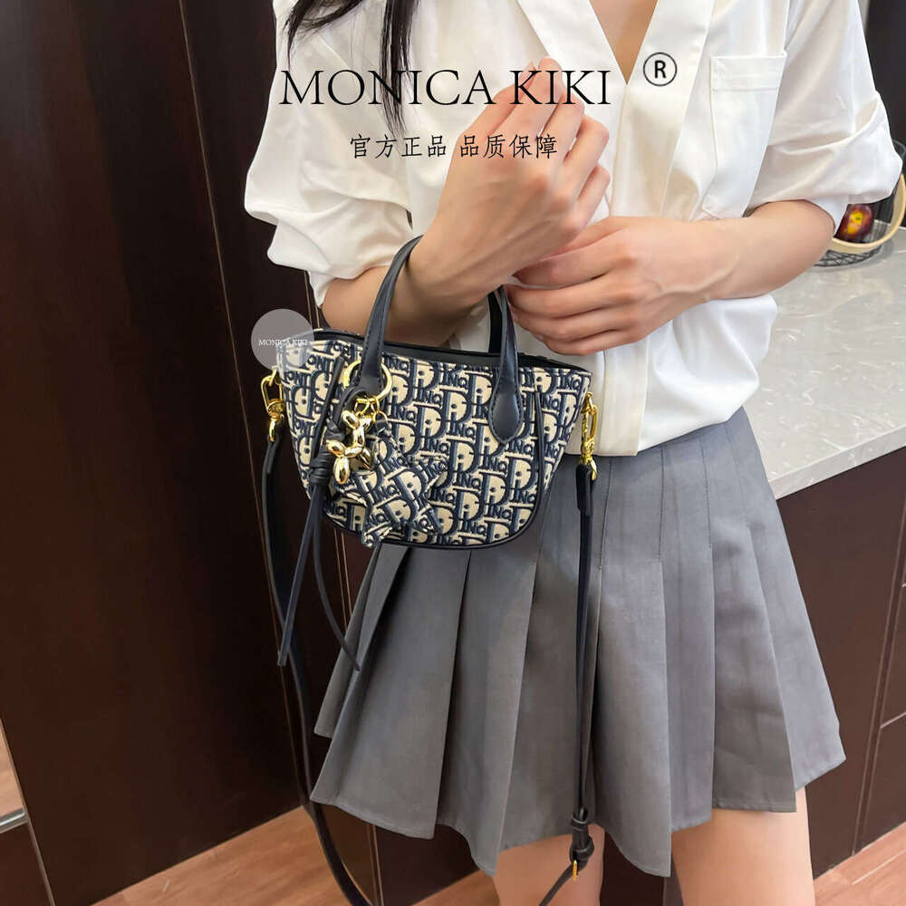 Monica kiki Light Luxury Jacquard Embroidery Handheld Bucket for Women New Large Capacity High-end Crossbody Bag