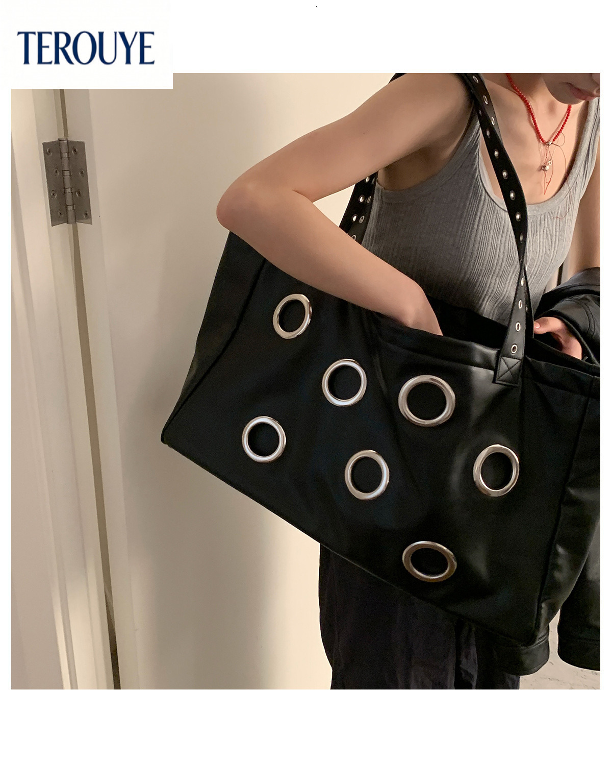 TEROUYE Korean style niche large capacity women s handbag new simple women s armpit bag hole design trendy luxury Luxury bag