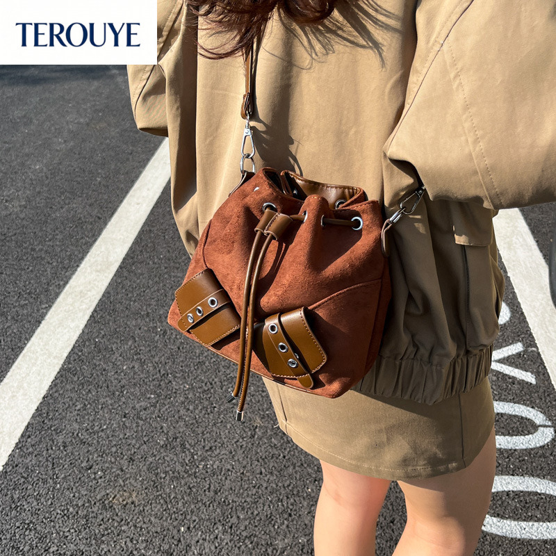 TEROUYE Autumn and winter retro style bucket bag for women s new fashionable niche drawstring design handbag suede luxury Luxury bag