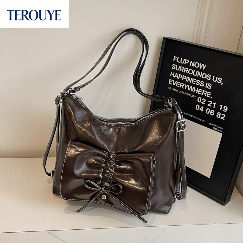TEROUYE Retro fashion women s handbag Korean style large capacity shoulder bag autumn and winter new casual bow design backpack luxury Luxury bag