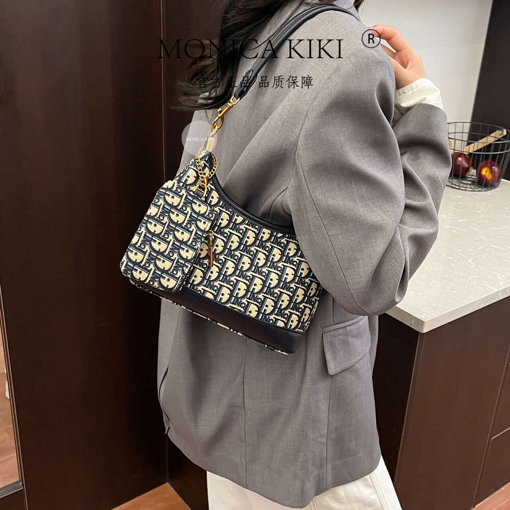 Monica kiki Handheld Vintage Free shipping Embroidered Floral Retro Underarm New High-end Feel Women's Single Shoulder Crossbody Dumpling Bag Ver
